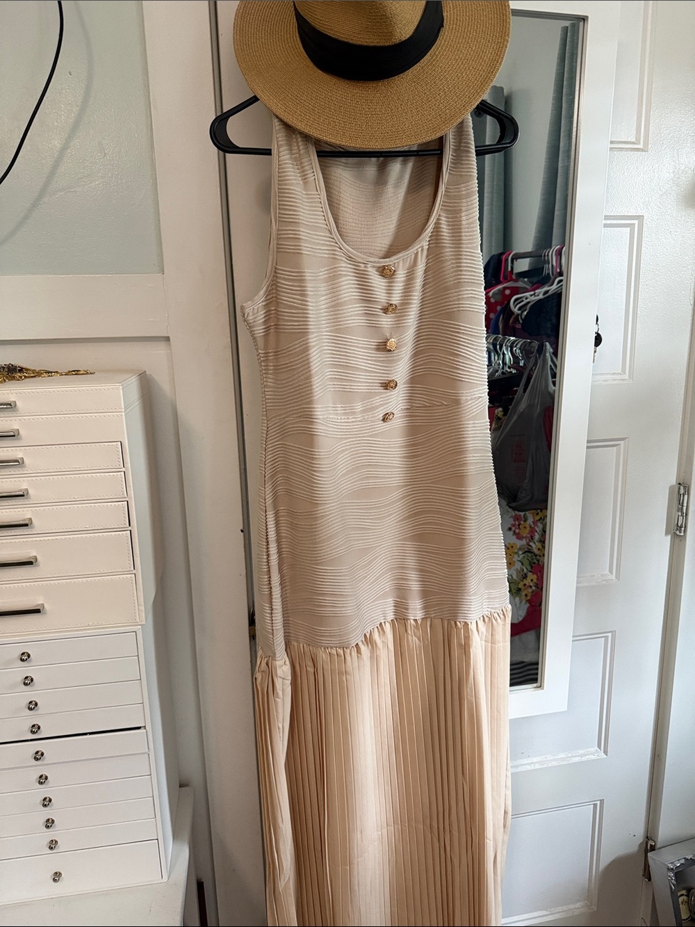 Sleeveless Cream Maxi Dress with Pleated Skirt and Button Front